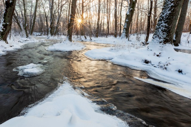 River, winter, snow, sun is shining through trees, frozen, Finland @Minna Jacobson
